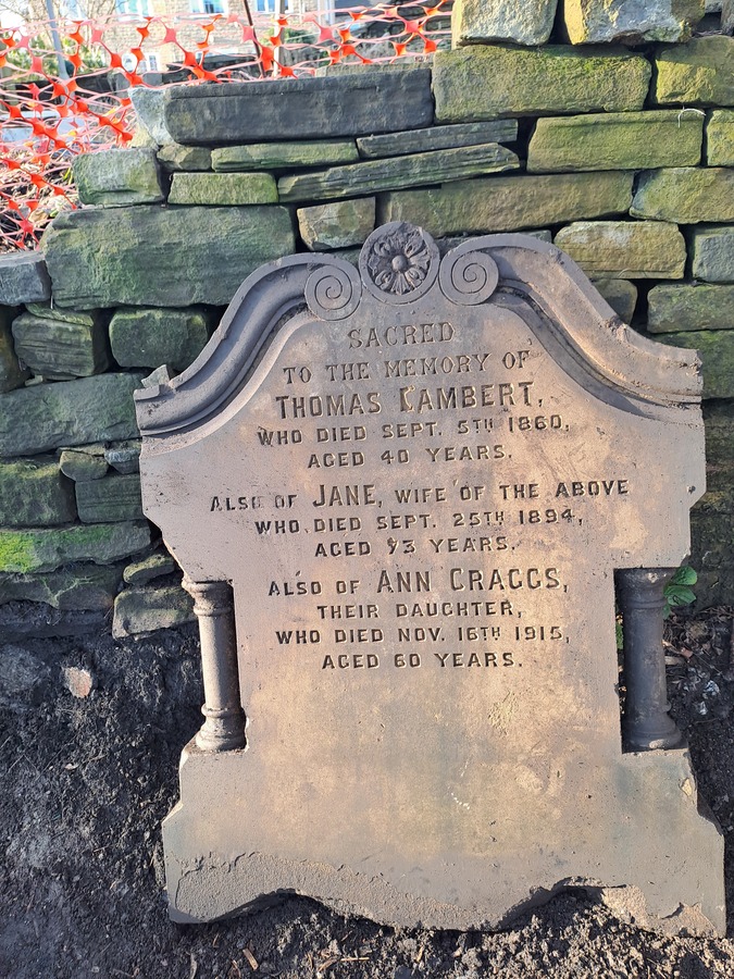 The headstone is in memory of Thomas Lambert who died in 1860, his wife Jane who died in 1894 and their daughter Ann Craggs who died in 1915